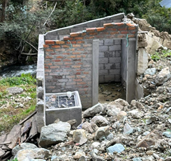 Una casa de piedra
Descripción generada automáticamente con confianza baja